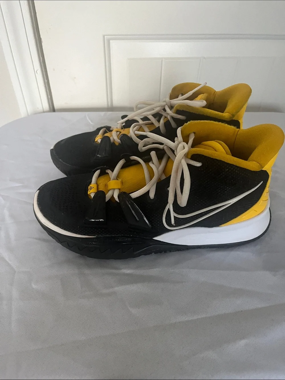 Nike Kyrie Black and Yellow High-Top Sneakers